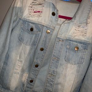 Distressed denim jacket